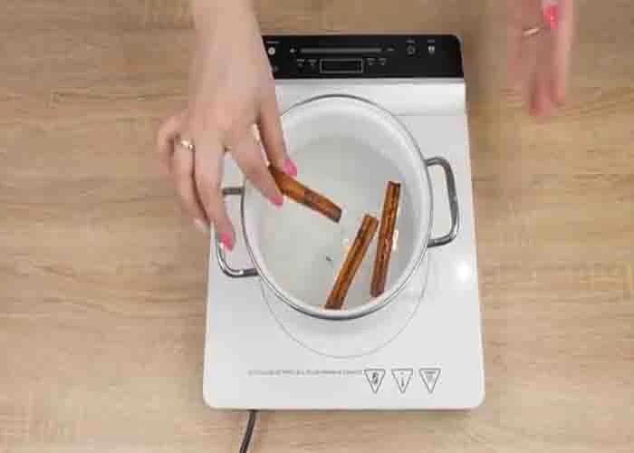 Adding cinnamon sticks to the bucket of your floor mop