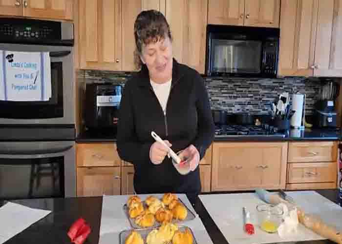 Adding the glaze to the pie bombs