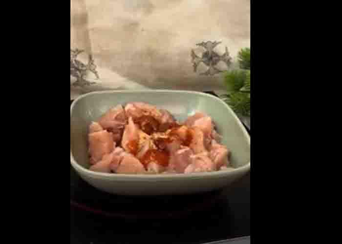 Marinating the chicken to make KFC-style chicken popcorn