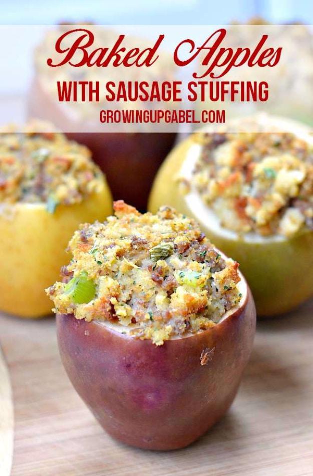 Savory baked apples stuffed with sausage and herb stuffing, browned on top and lined up in a baking dish