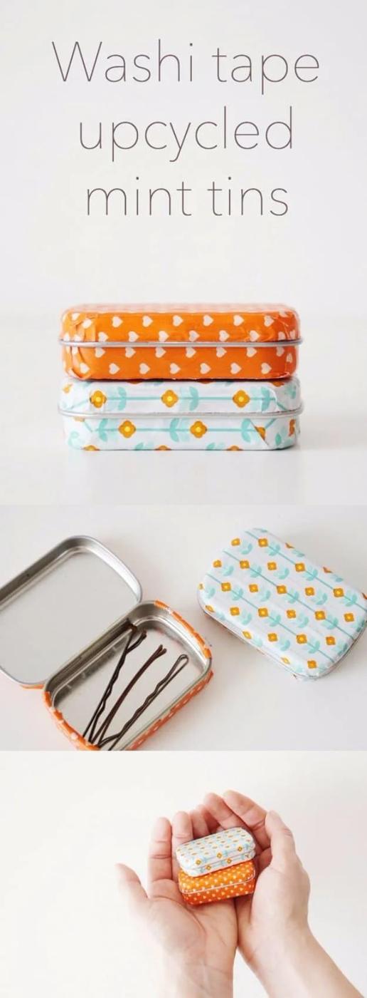 Three empty mint tins wrapped in pink, gold and mint green washi tape, open to show the little compartments inside