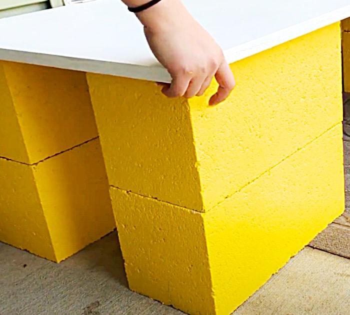 Add A Board On Top Of Cinder Blocks To Make A Bench