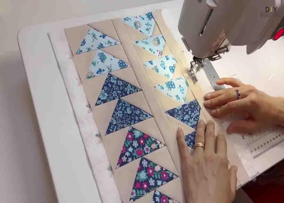 Sewing the flying geese placemat together