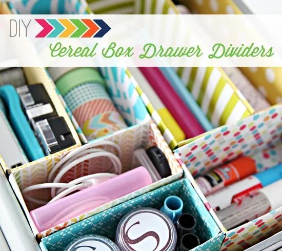Desk drawer fitted with paper covered cereal box dividers holding tape, cables and pens, under a typeset title