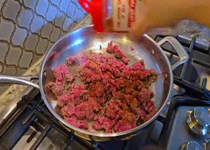 Cooking the ground beef for the spaghetti recipe
