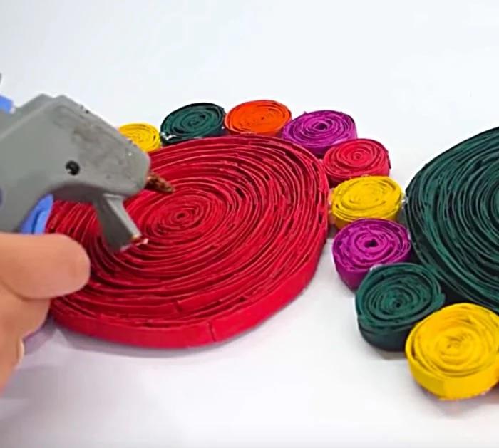 Make an artistic table runner with empty toilet rolls