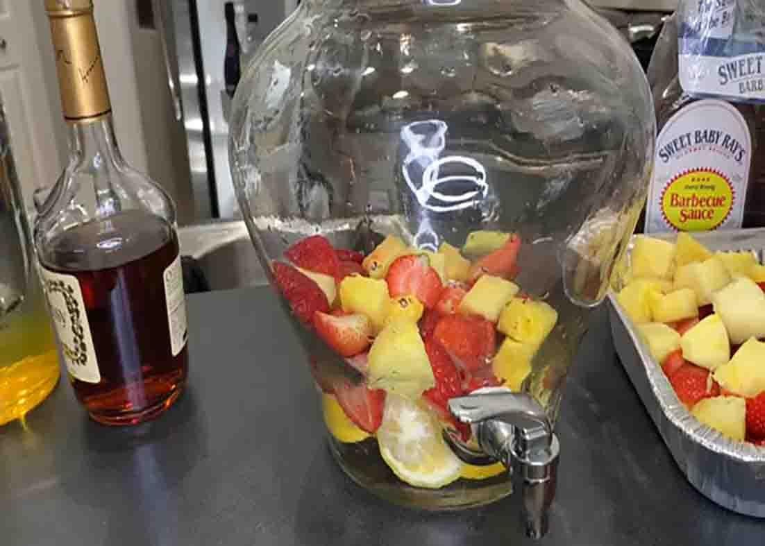 Adding the fruits to the hot girl summer hunch punch