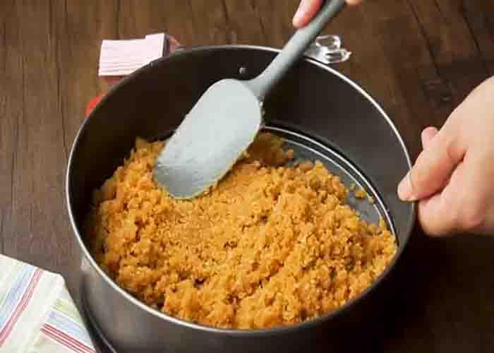 Making the crust for the pumpkin cheesecake