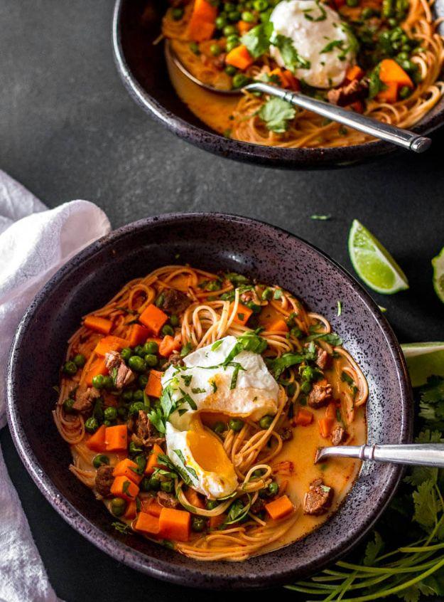 Peruvian beef noodle soup sopa criolla with angel hair pasta, sweet potato, green peas and a poached egg