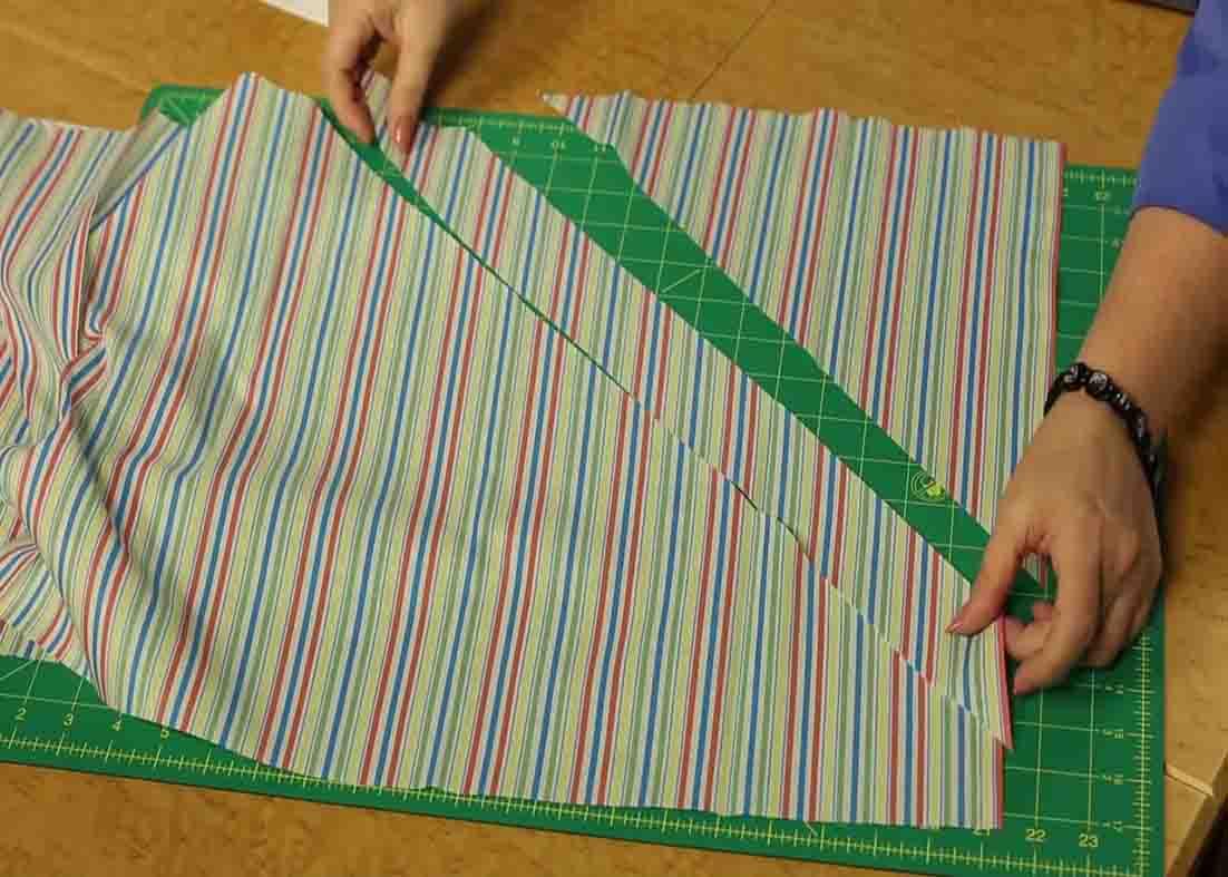 Cutting the yardage diagonally for the baby bricks quilt