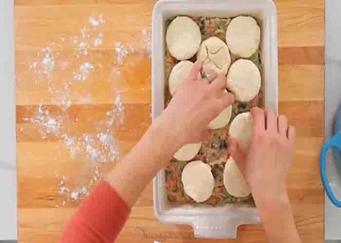 Assembling the chicken pot pie casserole