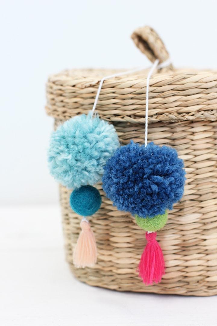 DIY Pom Tassel Storage Basket, a popular choice on this list and one of the more popular picks from this roundup