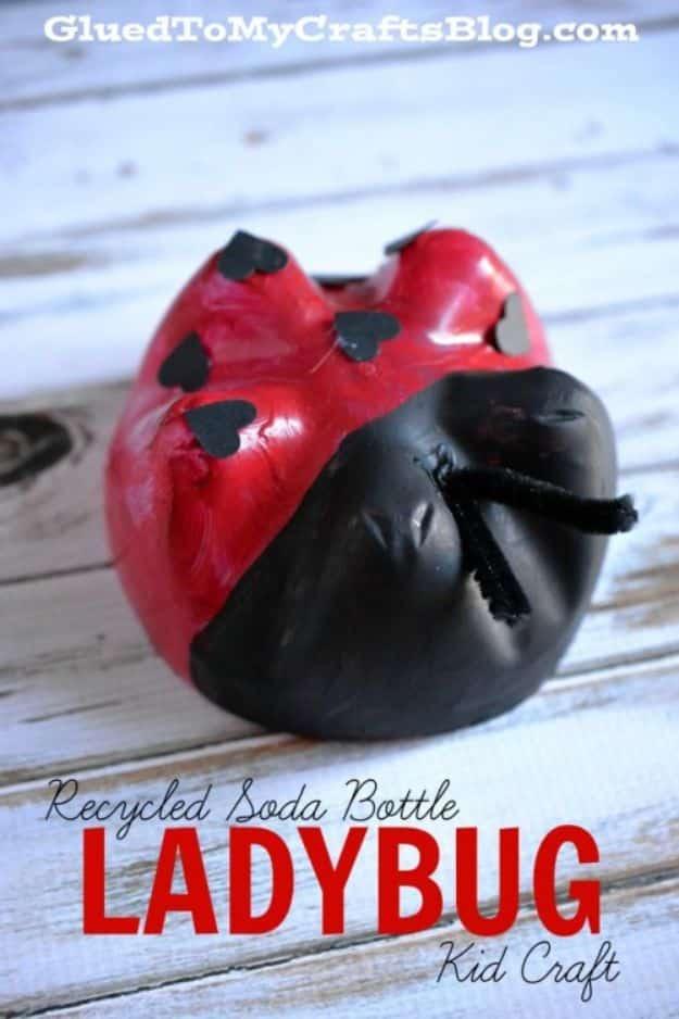 Ladybug made from the painted bottom of a red and black soda bottle with cardstock spots and antennae