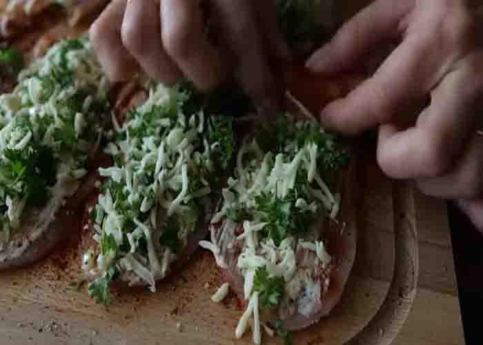 Rolling each chicken breasts