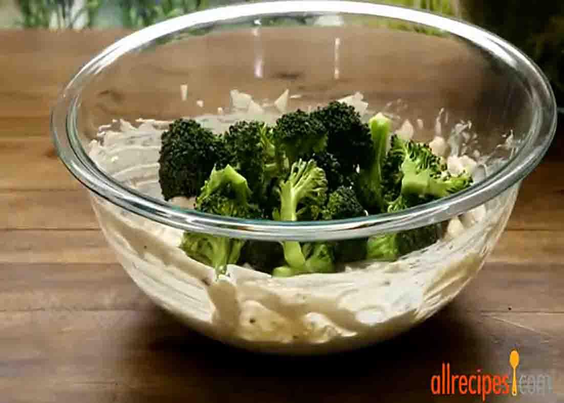 Combining all the ingredients for the broccoli casserole