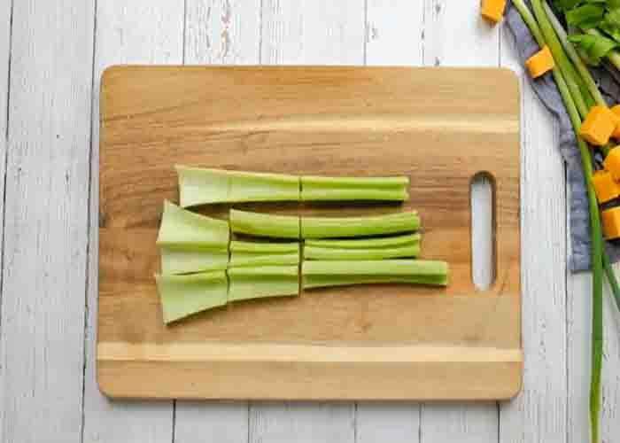 Cutting the celery into fourths for the celery stick appetizer