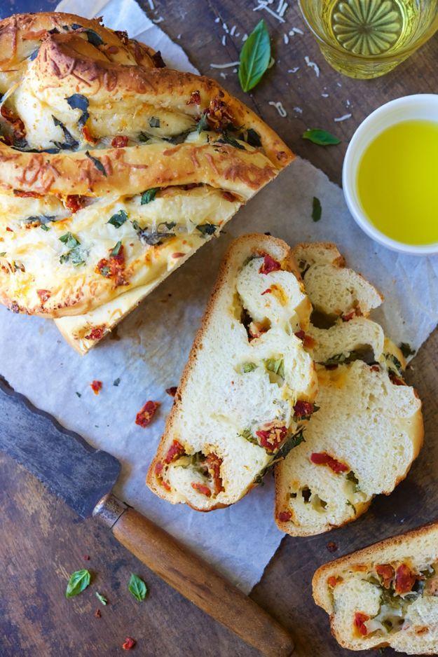 Pane bianco, an Italian filled bread loaf shaped into a figure eight with sun dried tomatoes and basil