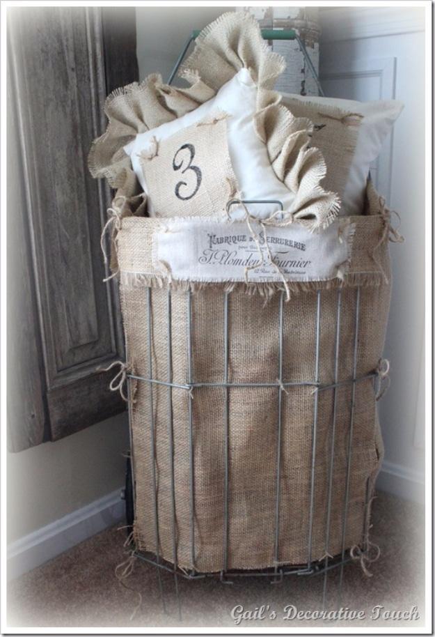 Vintage wire laundry cart lined with burlap, tied with a printed French label panel and filled with burlap pillows