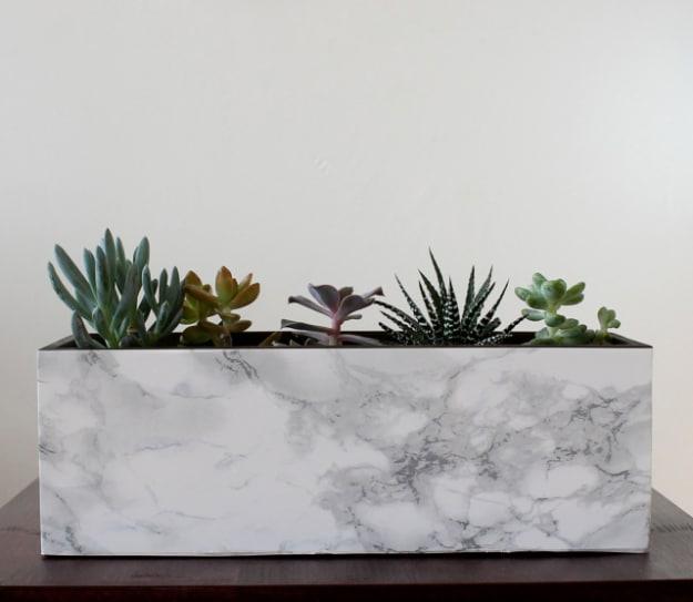 Faux Marble Planter DIY, an idea worth saving for later and a versatile idea that works in more than one room
