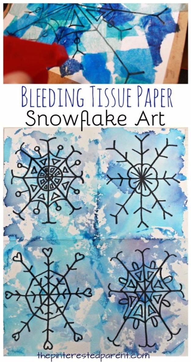 Four blue bleeding tissue snowflake paintings drawn in black marker, shown as a typeset craft graphic