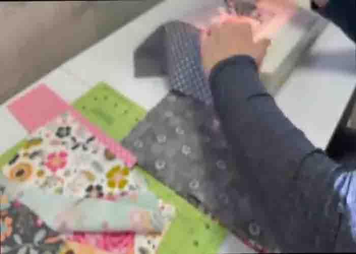 Sewing the layer cake pieces together