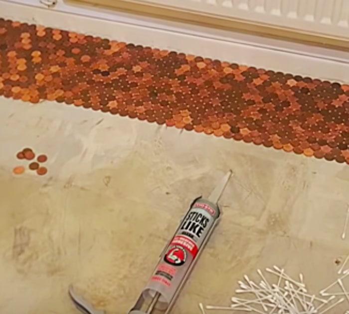 Try a new idea in the bathroom or kitchen by making an epoxy floor made with pennies