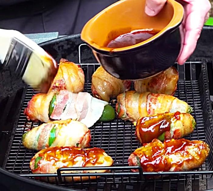 Grill Jalapeno Poppers Stuffed With Ground Beef And Wrapped In Bacon