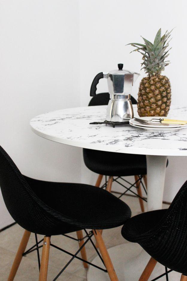 DIY Faux Marble Table Top, a simple hack using tools most people already own and a favorite pick from this roundup