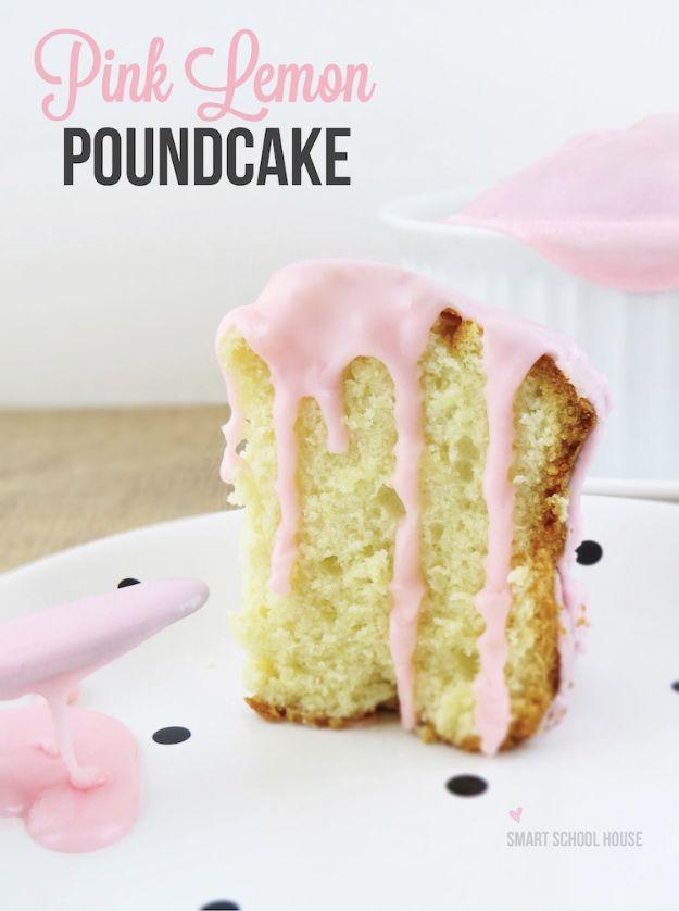 Pink lemon pound cake baked in a round shape with pink glaze dripping down the sides and one slice cut out