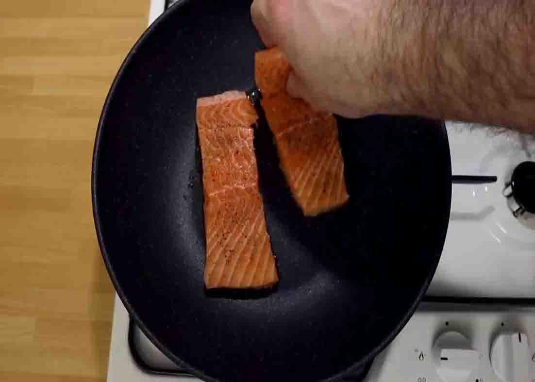 Pan-searing the salmon before making the lemon butter sauce