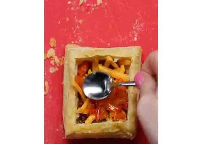 Assembling the puff pastry breakfast cups