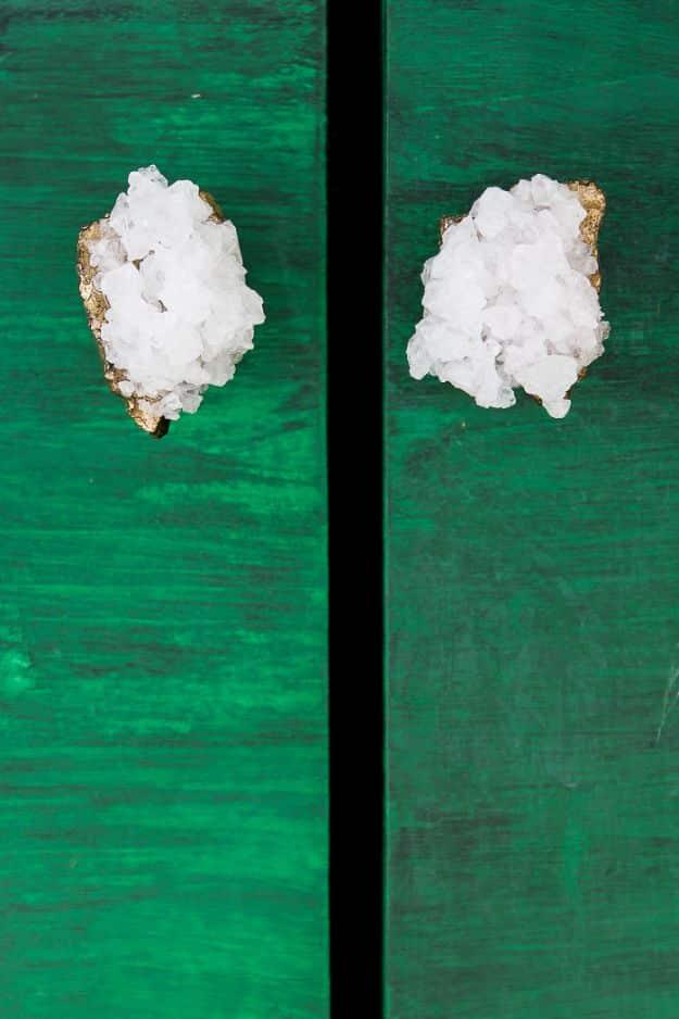 DIY faux crystal knobs, two white gold edged crystal cluster knobs on an emerald green painted cabinet front