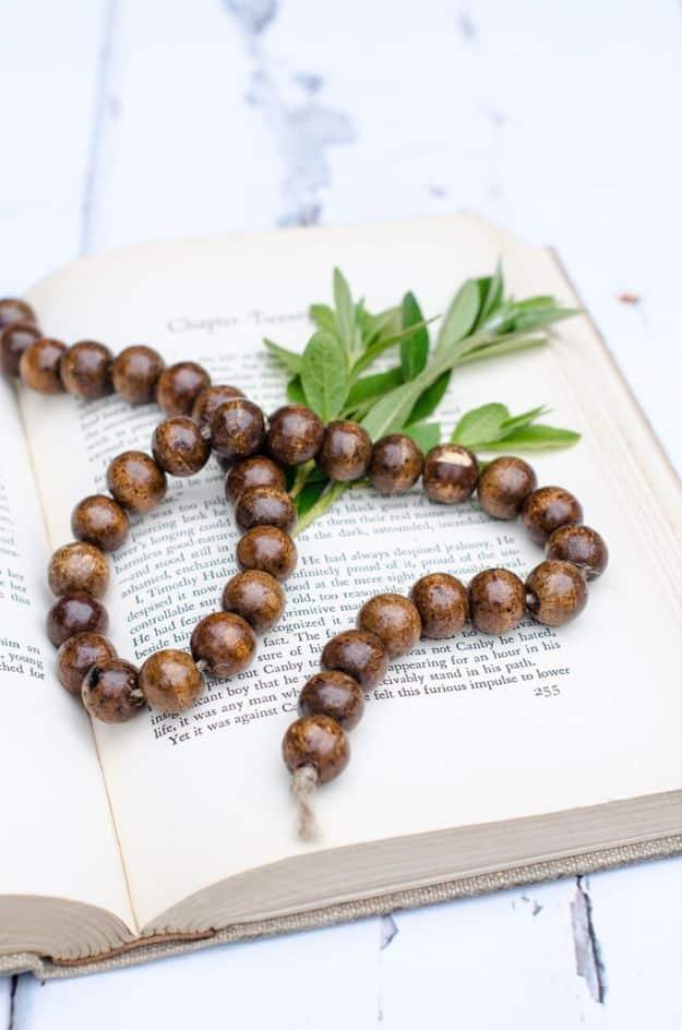 Make A Wood Bead Garland Out Of A thrift Store Bracelet, easy enough for a beginner and a charming handmade detail