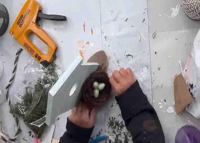 Assembling the DIY spring birdhouse decor