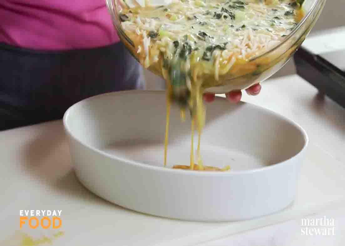 Transferring the spinach mixture to the casserole