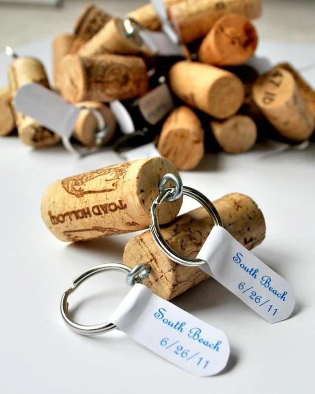 Handmade keychain made from a wine cork, an eye screw and a colorful charm, an upcycled craft to sell