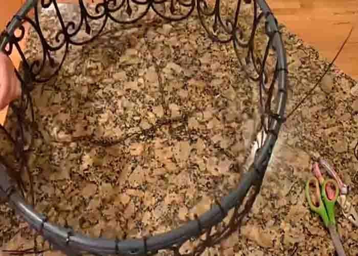 Attaching the chains to the outdoor chandelier