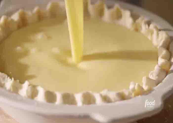 Assembling the lemon buttermilk pie
