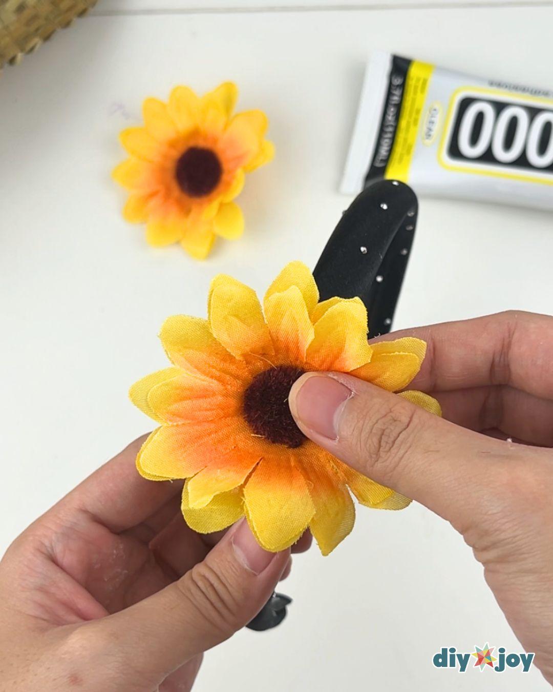 Easy Couples Costume Sunflower And Gardener - sunflower headband with one flower glued to a plain black band.