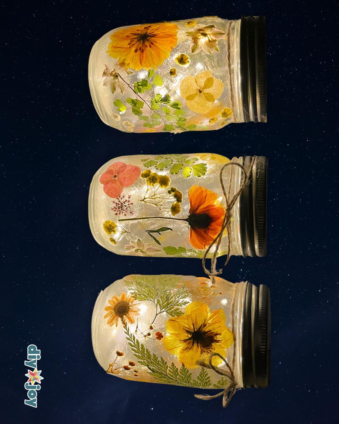 Glass jar filled with LED fairy lights and pressed flowers - beautiful money-making craft for Etsy or markets