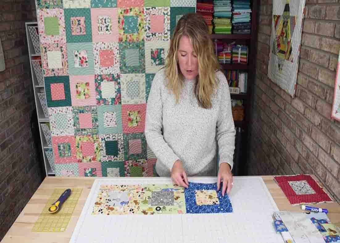 Laying up the blocks to make the square dance quilt