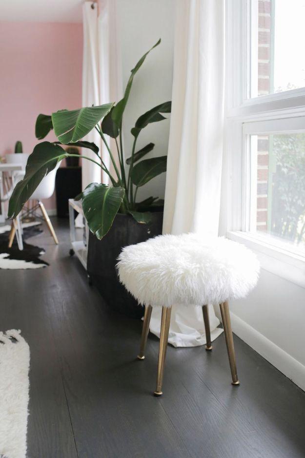 White Furry Stool, one of the best white decor ideas on this list and a creative way to reuse what you already have
