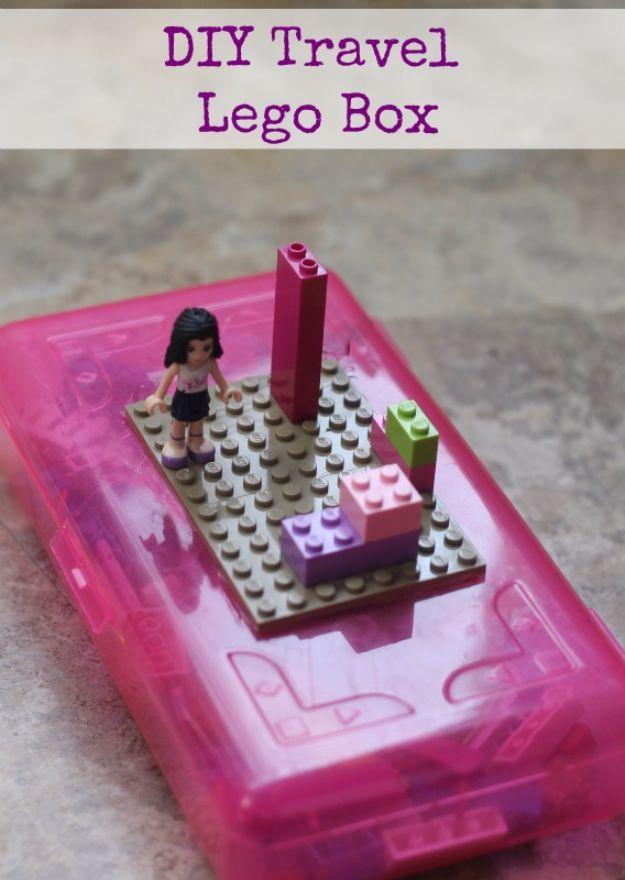 DIY travel Lego box, a pink plastic pencil case with a gray base plate glued to the lid and bricks and a figure