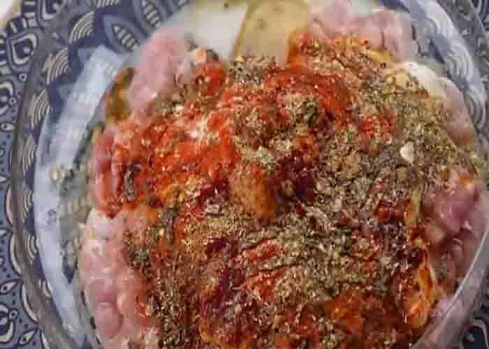 Marinating the chicken for the tikka sliders recipe