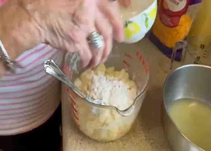 Combining all the ingredients for the pineapple casserole