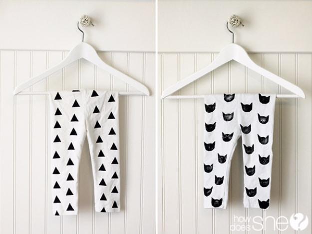 Plain black leggings hand stamped with a repeating white triangle, worn and mid stride, Etsy shop ideas to sell