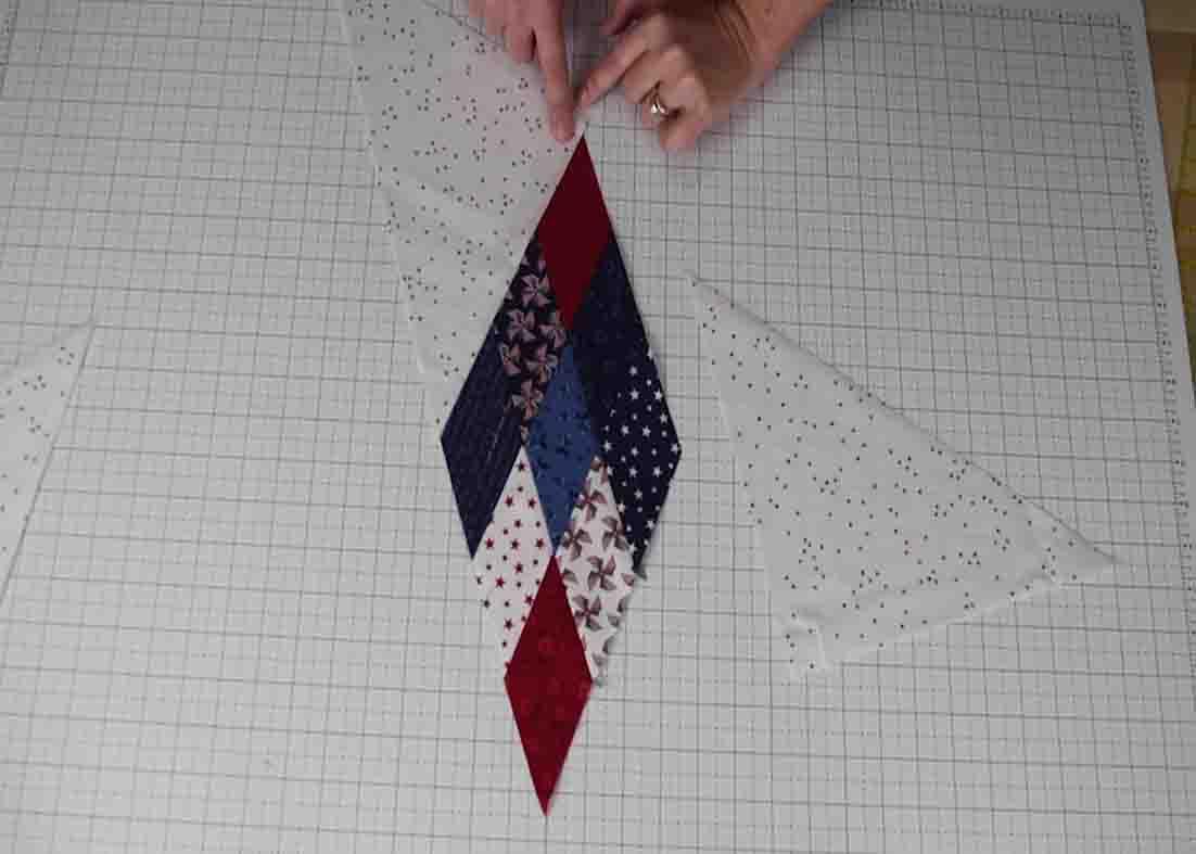 Attaching the background fabric to the lone star quilt pattern