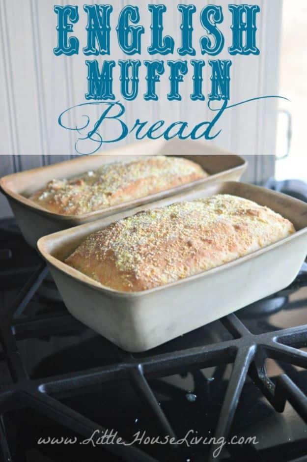 Two pans of English muffin bread cooling on a stovetop with cornmeal dusted tops and a title overlay