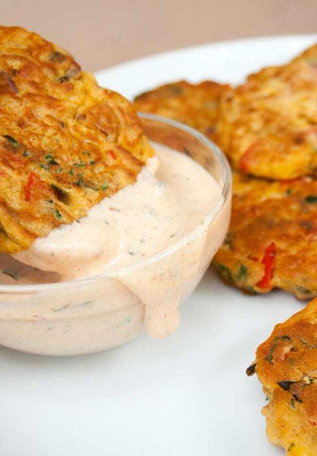 Golden vegetable fritters made with chickpea flour, red pepper and corn, a gluten free vegan appetizer