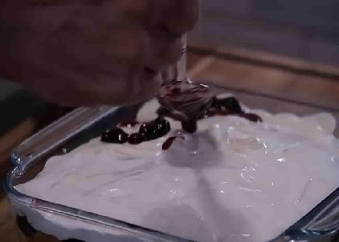 Topping the pound cake with some fresh blueberry